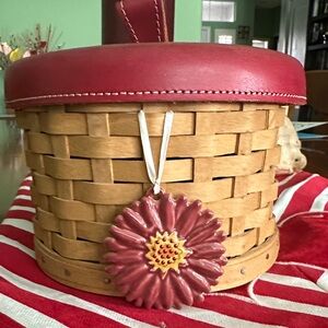 Elegant Red and Tan Woven Basket with Floral Accent